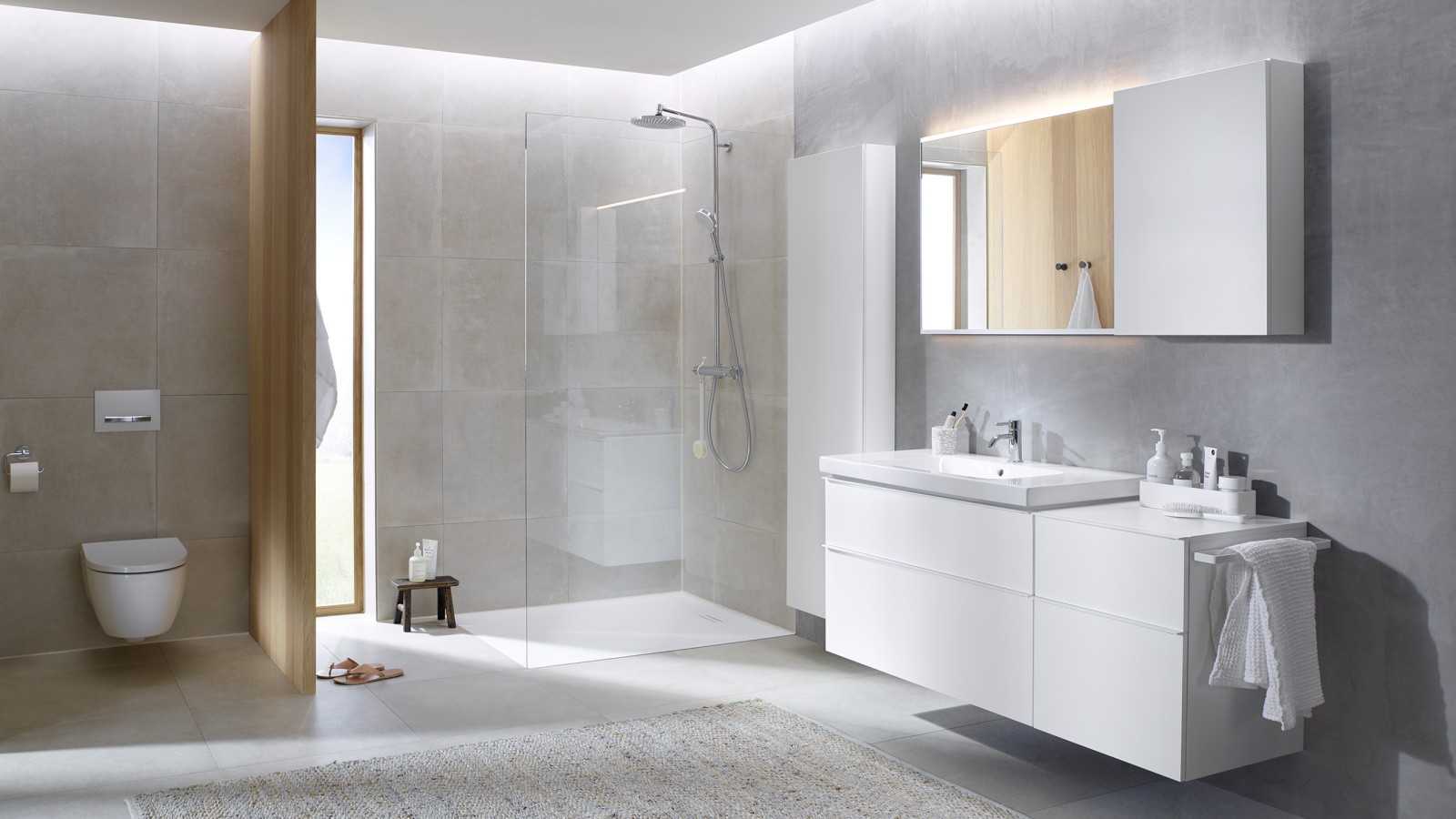 Family bathroom with large tiles and bathroom furniture plus bathroom ceramics from Geberit iCon Family bathroom with large tiles and bathroom furniture plus bathroom ceramics from Geberit iCon