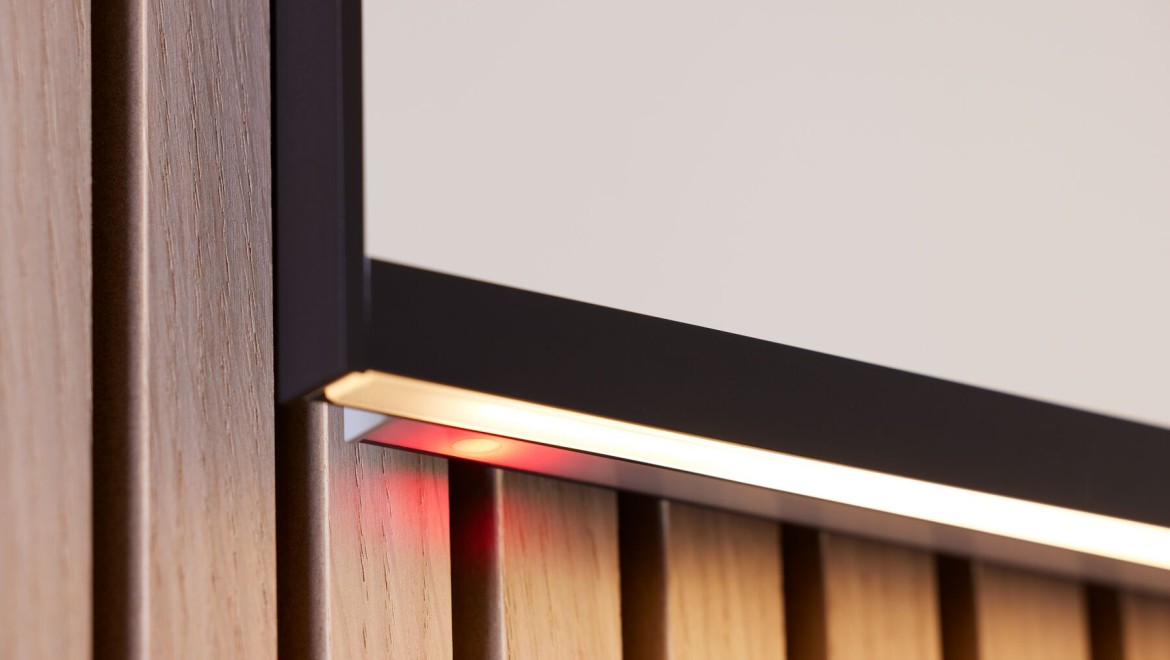 Geberit Plus Square 125cm in matt black with indirect light strip.