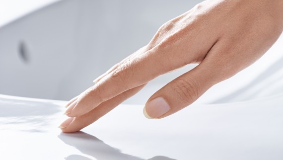 Hand brushes over washbasin ceramic appliance with KeraTect coating Hand brushes over washbasin ceramic appliance with KeraTect coating