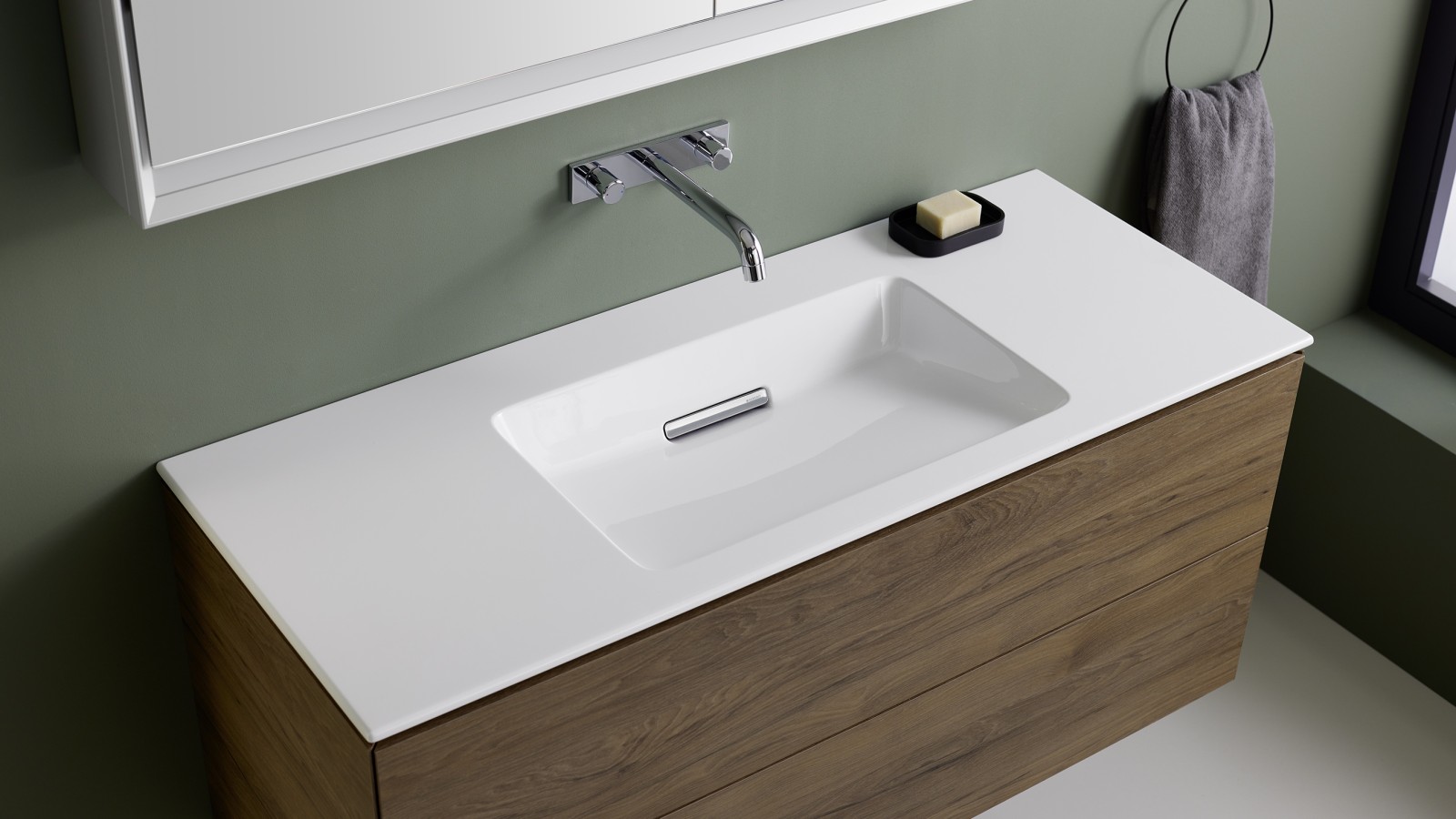 Geberit ONE washbasin with slim-rim washbasin and cabinet in walnut brown