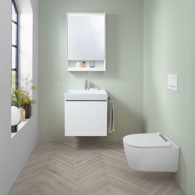 Geberit ONE washbasin area with small handrinse basin, washbasin cabinet and mirror cabinet, plus a shower toilet. Geberit ONE washbasin area with small handrinse basin, washbasin cabinet and mirror cabinet, plus a shower toilet.