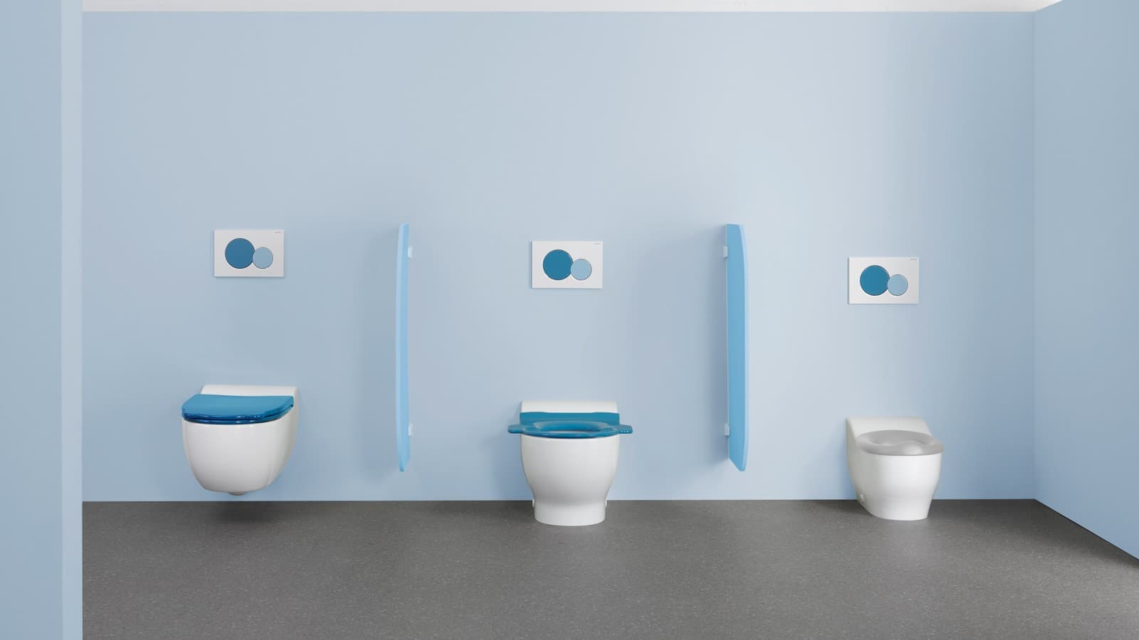 Toilets from the Geberit Bambini bathroom series with colourful WC lids and flush plates Toilets from the Geberit Bambini bathroom series with colourful WC lids and flush plates