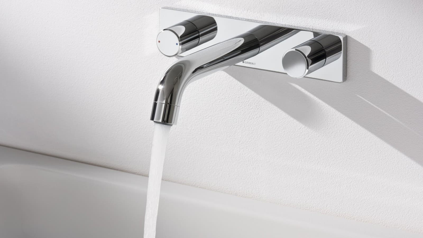 Geberit wall-mounted taps with running water Geberit wall-mounted taps with running water
