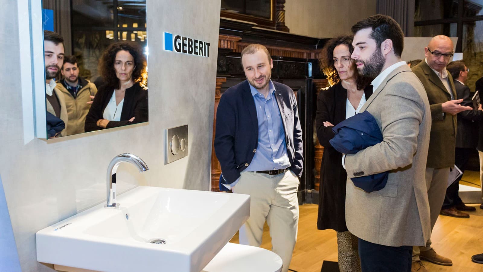 People in a Geberit showroom People in a Geberit showroom